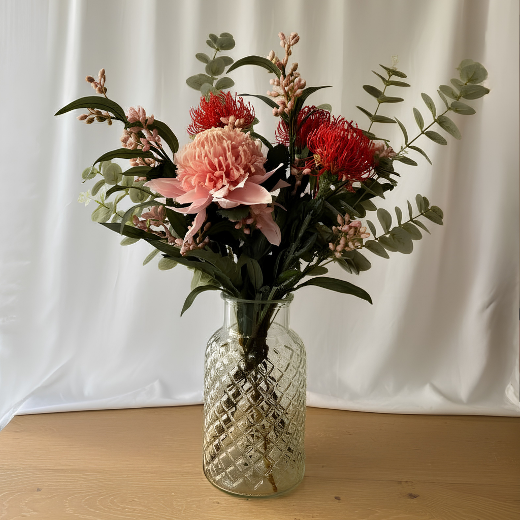 Pink Waratah Arrangement in Textured Glass Vase
