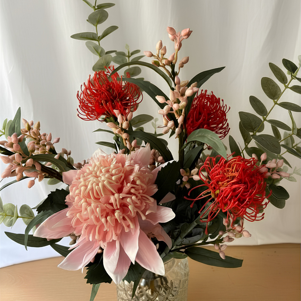 Pink Waratah Arrangement in Textured Glass Vase