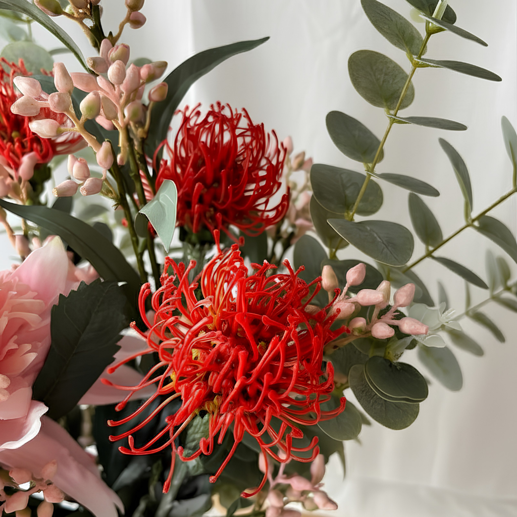 Pink Waratah Arrangement in Textured Glass Vase